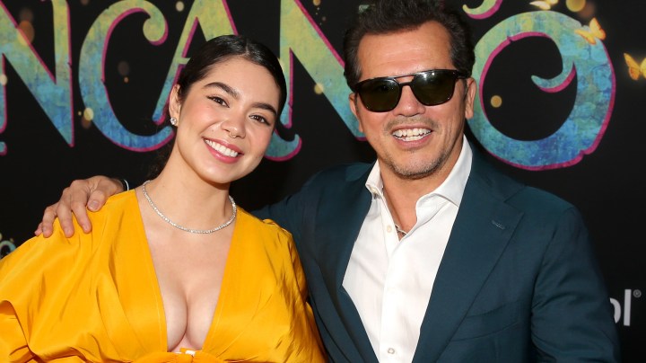LOS ANGELES, CALIFORNIA - NOVEMBER 03: (L-R) Auli'i Cravalho and John Leguizamo attend the world premiere of Walt Disney Animation Studios' Encanto at El Capitan Theatre in Hollywood, California on November 03, 2021. (Photo by Jesse Grant/Getty Images for Disney)