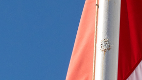 Flags of United States, Mexico, Canada flying together, concept of new NAFTA trade agreement now known as USMCA in the USA, CUSMA in Canada or T-MEC in Mexico.