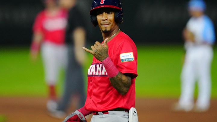 PANAMA CITY, PANAMA - OCTOBER 01: Jose Ramos #99 of Team Panama reacts after singling in the fourth inning during Game Four between Team Argentina and Team Panama at Rod Carew National Stadium on October 1, 2022 in Panama City, Panama. (Photo by Daniel Shirey/WBCI/MLB Photos via Getty Images)