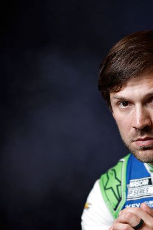 CHARLOTTE, NORTH CAROLINA - JANUARY 18: NASCAR driver Daniel Suarez poses for a photo during NASCAR Production Days at Charlotte Convention Center on January 18, 2023 in Charlotte, North Carolina. (Photo by Jared C. Tilton/Getty Images)