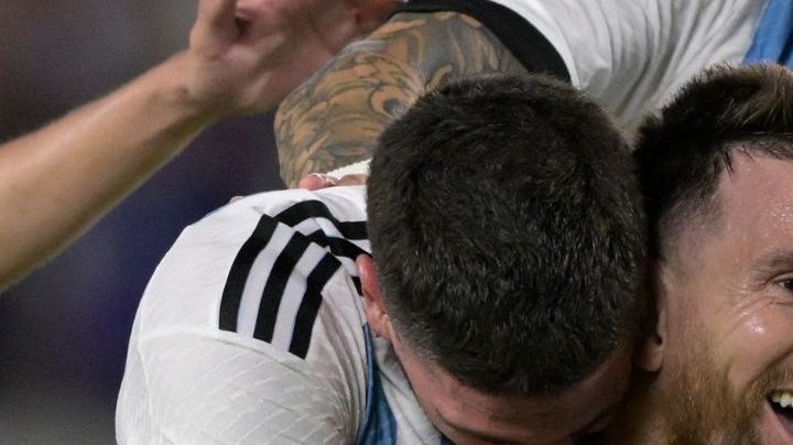 Argentina's forward Lionel Messi (C) celebrates with Argentina's midfielder Rodrigo De Paul (L) and Argentina's midfielder Thiago Almada after scoring a goal during the friendly football match between Argentina and Panama at the Monumental stadium in Buenos Aires, on March 23, 2023. - Lionel Messi capped a night of unbridled joy with the 800th goal of his career as world champions Argentina celebrated their homecoming with a 2-0 friendly victory over stubborn Panama in Buenos Aires on Thursday. (Photo by JUAN MABROMATA / AFP) (Photo by JUAN MABROMATA/AFP via Getty Images)