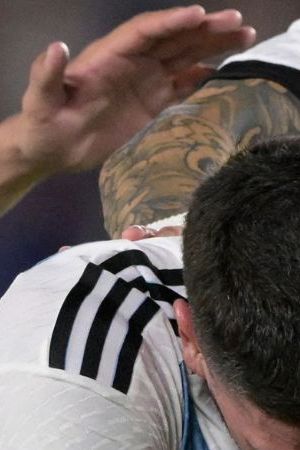 Argentina's forward Lionel Messi (C) celebrates with Argentina's midfielder Rodrigo De Paul (L) and Argentina's midfielder Thiago Almada after scoring a goal during the friendly football match between Argentina and Panama at the Monumental stadium in Buenos Aires, on March 23, 2023. - Lionel Messi capped a night of unbridled joy with the 800th goal of his career as world champions Argentina celebrated their homecoming with a 2-0 friendly victory over stubborn Panama in Buenos Aires on Thursday. (Photo by JUAN MABROMATA / AFP) (Photo by JUAN MABROMATA/AFP via Getty Images)