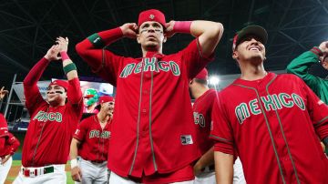 PHOENIX, AZ - MARCH 17: Joey Meneses #32 of Team Mexico celebrates with teammates after Team Mexicos 5-4 win in the 2023 World Baseball Classic Quarterfinal game between Team Puerto Rico and Team Mexico at loanDepot Park on Friday, March 17, 2023 in Miami, Florida. (Photo by Daniel Shirey/WBCI/MLB Photos via Getty Images)
