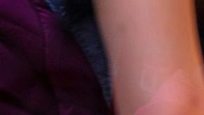 Pizzeria glass window. Variety of italian pizzas in a shop display, street food. Kitchen workers arranging the pizzas.