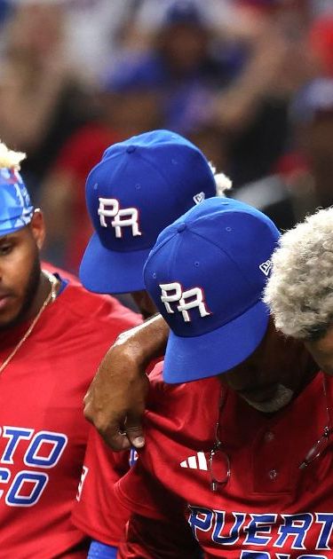 MIAMI, FLORIDA - MARCH 15: Edwin Diaz #39 of Team Puerto Rico is carried off the field after sustaining an injury while celebrating a 5-2 win against Team Dominican Republic during their World Baseball Classic Pool D game at loanDepot park on March 15, 2023 in Miami, Florida. (Photo by Al Bello/Getty Images)