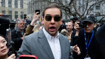 NEW YORK, NEW YORK - APRIL 04: U.S. Rep. George Santos (R-NY) walks through the crowd gathered outside the courthouse where former U.S. President Donald Trump will arrive later in the day for his arraignment on April 4, 2023 in New York City. With his indictment, Trump will become the first former U.S. president in history to be charged with a criminal offense. (Photo by Drew Angerer/Getty Images)