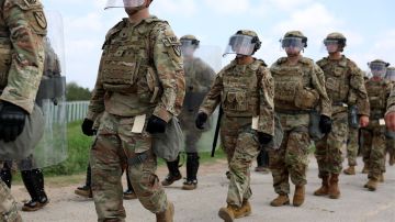 BROWNSVILLE, TEXAS - MAY 10: Members of the Texas National Guard are deployed to an area of high migrant crossings along the United States border with Mexico on May 10, 2023 in Brownsville, Texas. A surge of immigrants is expected with the end of the U.S. government's Covid-era Title 42 policy, which for the past three years has allowed for the quick expulsion of irregular migrants entering the country. More than 29,000 individuals are in U.S. Customs and Border Protection custody, including nearly 18,000 in the last 24 hours. (Photo by Joe Raedle/Getty Images)