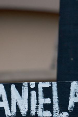 ALLEN, TEXAS - MAY 09: The names of victims are written on crosses setup in a memorial near the scene of a mass shooting at the Allen Premium Outlets mall on May 9, 2023 in Allen, Texas. Eight people were killed and seven wounded in the Saturday attack in which the gunman was killed by police, according to published reports. Three of the wounded are in critical condition, according to the reports. (Photo by Joe Raedle/Getty Images)
