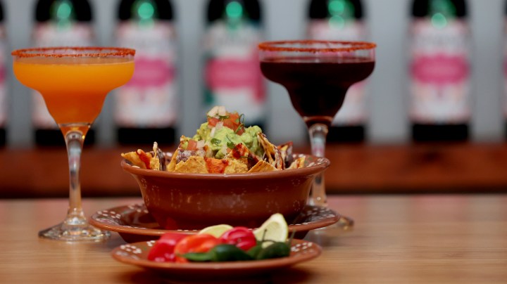 Madrid Spain; 05.03.2023.- Madrid Spain. "Las Mañanitas" restaurant in Madrid wins the Dubai 2023 "Taco de Oro" award. Israel Tellez director of the group and Itzel Gonzalez show us part of their food and drinks. Mango (Left) and Jamaican (Right) Margarita glasses and Nachos. The recognition for "Las Mañanitas", inaugurated 26 years ago in Madrid, is given within the category of Authentic Mexican Restaurant Abroad. The Taco de Oro award is a statuette covered with 24-carat gold sheets and black diamonds that represent a Mexican bean taco and recognizes the work of Mexicans who are outside of Mexico promoting the gastronomy of this country. The Cocineros MX por el Mundo platform will present the award to its owner, businessman Ernesto Díaz Trincado, on April 14 in Dubai. Ernesto Díaz Trincado will receive the award on April 14 at a gala that will take place at the Hyatt Regency Dubai Creek Heights.Photo: Juan Carlos Rojas (Photo by Juan Carlos Rojas/picture alliance via Getty Images)
