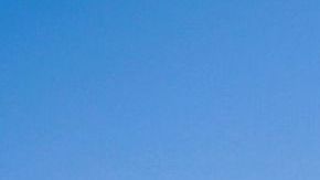 People visit the Temple of Quechula church that emerged from the Malpaso Dam due to a drought that dried up the Grijalba River in Nuevo Quechula, Chiapas, on June 16, 2023. The 16th-century Dominican church has been uncovered by the drought and high temperatures that plague the country. The construction had been almost completely submerged when the dam was built in the area in the 1960s on a tributary of the Grijalva River. Since then, tourists have been arriving by boat to visit it. However, the low level of the dam due to high temperatures, which left eight people dead in Mexico in the last week, meant that the construction was completely exposed, and now visitors arrive at its gates in their cars and motorcycles. (Photo by Raul VERA / AFP) (Photo by RAUL VERA/AFP via Getty Images)