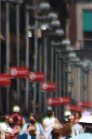 June 22, 2023 in Mexico City, Mexico: People protect themselves from the sun with umbrellas and quench their thirst with ice cream as they walk through the historic center, during the Orange Alert due to forecast high temperatures. (Photo credit should read Carlos Santiago / Eyepix Group/Future Publishing via Getty Images)