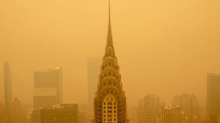 NEW YORK, NEW YORK - JUNE 7: Smoky haze from wildfires in Canada diminishes the visibility of the Chrysler Building on June 7, 2023 in New York City. New York topped the list of most polluted major cities in the world on Tuesday night, as smoke from the fires continues to blanket the East Coast. (Photo by David Dee Delgado/Getty Images)