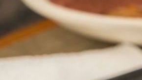 A dish of pupusas and others mexican food on the table - stock photo