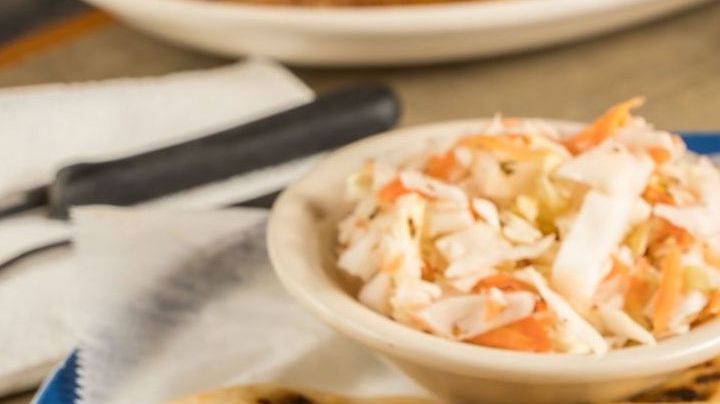 A dish of pupusas and others mexican food on the table - stock photo