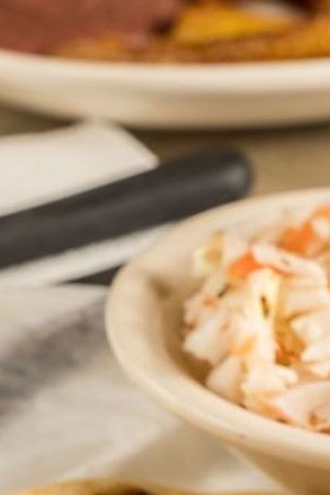 A dish of pupusas and others mexican food on the table - stock photo