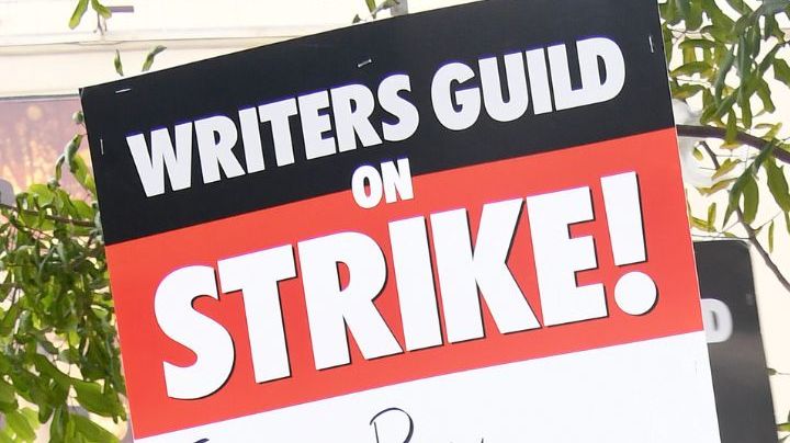 BURBANK, CALIFORNIA - MAY 24: Guild members participate in the Writers Guild Of America Strike: Superhero Day held in front of Warner Bros. Studios on May 24, 2023 in Burbank, California. (Photo by Albert L. Ortega/Getty Images)