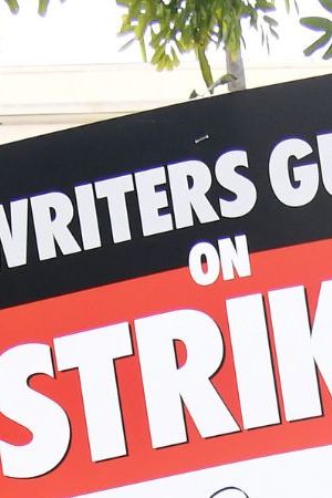 BURBANK, CALIFORNIA - MAY 24: Guild members participate in the Writers Guild Of America Strike: Superhero Day held in front of Warner Bros. Studios on May 24, 2023 in Burbank, California. (Photo by Albert L. Ortega/Getty Images)
