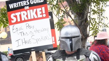 BURBANK, CALIFORNIA - MAY 24: Guild members participate in the Writers Guild Of America Strike: Superhero Day held in front of Warner Bros. Studios on May 24, 2023 in Burbank, California. (Photo by Albert L. Ortega/Getty Images)