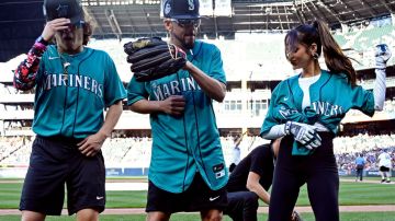 SEATTLE, WA - JULY 08: Marcello Hernandez #23, Yandel #150 and Natti Natasha #1 of Team Finch dance during the MLB All-Star Celebrity Softball Game presented by Corona at T-Mobile Park on Saturday, July 8, 2023 in Seattle, Washington. (Photo by Cheyenne Boone/MLB Photos via Getty Images)