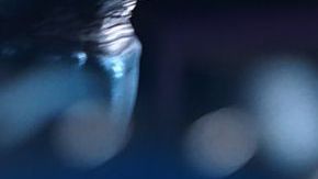 Blue Beetle costume with canon hands