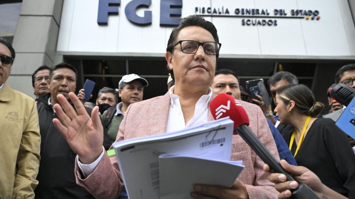 Former Assembly member and now presidential candidate, Fernando Villavicencio, speaks to journalists upon his arrival at the Attorney General's Office in Quito on August 8, 2023. Fernando Villavicencio asked the Attorney General's Office to investigate former officials related to the oil sector of the governments of Rafael Correa, Lenín Moreno, and Guillermo Lasso as part of a criminal complaint that he filed on Tuesday. (Photo by Rodrigo BUENDIA / AFP) (Photo by RODRIGO BUENDIA/AFP via Getty Images)