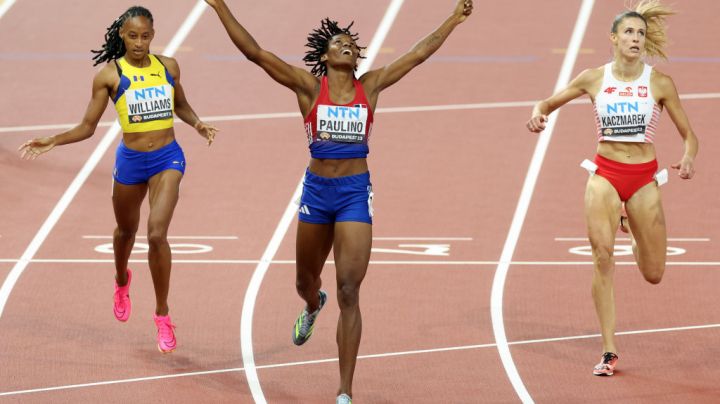 BUDAPEST, HUNGARY - AUGUST 23: Marileidy Paulino of Team Dominican Republic celebrates winning the Women's 400m Final during day five of the World Athletics Championships Budapest 2023 at National Athletics Centre on August 23, 2023 in Budapest, Hungary. (Photo by Stephen Pond/Getty Images for World Athletics)