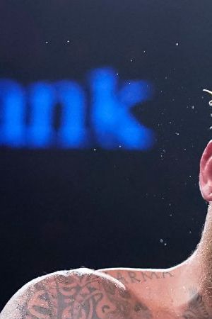 DALLAS, TEXAS - AUGUST 05: Jake Paul, left, and Nate Diaz, right, trade punches during the tenth round of their fight at the American Airlines Center on August 05, 2023 in Dallas, Texas. (Photo by Sam Hodde/Getty Images)