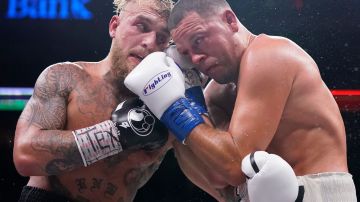 DALLAS, TEXAS - AUGUST 05: Jake Paul, left, and Nate Diaz, right, trade punches during the tenth round of their fight at the American Airlines Center on August 05, 2023 in Dallas, Texas. (Photo by Sam Hodde/Getty Images)