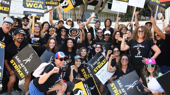 CULVER CITY, CALIFORNIA - AUGUST 04: Members of Latinas Acting Up pose for a photo while SAG-AFTRA and WGA walk the picket line at Sony Studios on August 04, 2023 in Culver City, California. Members of SAG-AFTRA and WGA (Writers Guild of America) have both walked out in their first joint strike against the studios since 1960. The strike has shut down a majority of Hollywood productions with writers in the third month of their strike against the Hollywood studios. (Photo by Albert L. Ortega/Getty Images)