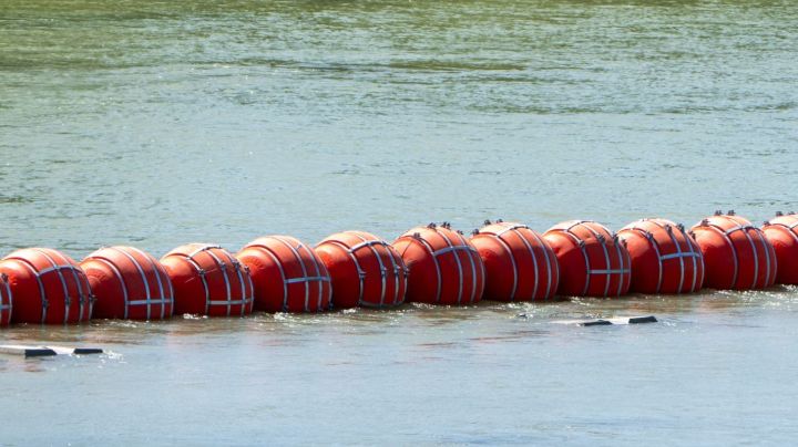 River barrier placed on the water along the Rio Grande border with Mexico in Eagle Pass, Texas, on July 15, 2023, to prevent migrants from entering the US. The buoy installation is part of an operation Texas is pursuing to secure its borders, but activists and some legislators say Governor Greg Abbott is exceeding his authority. (Photo by SUZANNE CORDEIRO / AFP) (Photo by SUZANNE CORDEIRO/AFP via Getty Images)