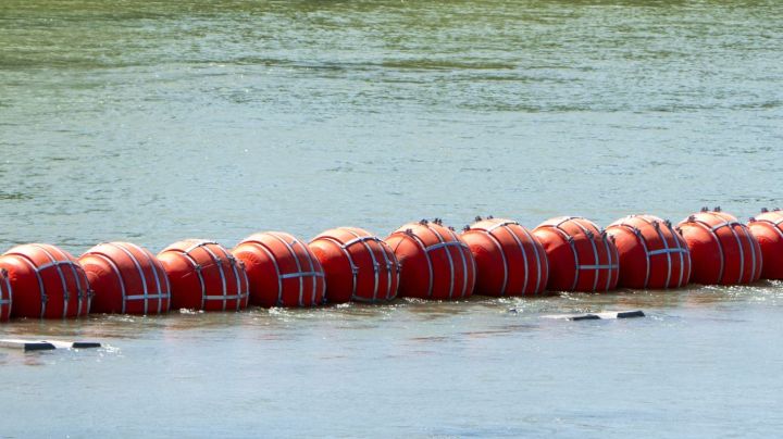 River barrier placed on the water along the Rio Grande border with Mexico in Eagle Pass, Texas, on July 15, 2023, to prevent migrants from entering the US. The buoy installation is part of an operation Texas is pursuing to secure its borders, but activists and some legislators say Governor Greg Abbott is exceeding his authority. (Photo by SUZANNE CORDEIRO / AFP) (Photo by SUZANNE CORDEIRO/AFP via Getty Images)