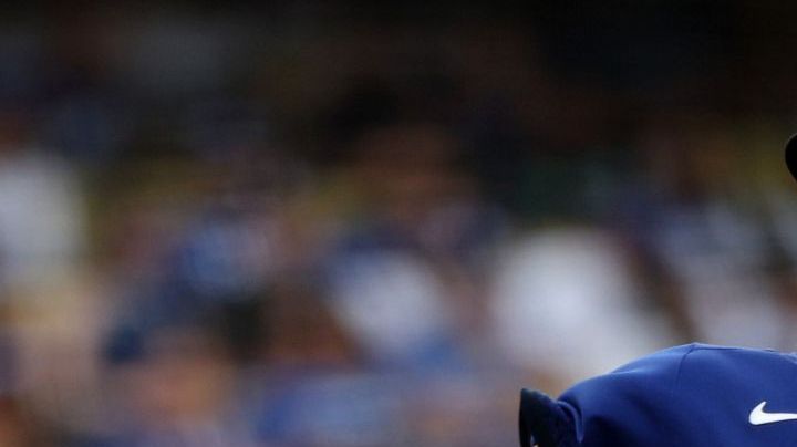 LOS ANGELES, CALIFORNIA - AUGUST 19: Julio Urías #7 of the Los Angeles Dodgers pitches against the Miami Marlins during the second inning at Dodger Stadium on August 19, 2023 in Los Angeles, California. (Photo by Harry How/Getty Images)