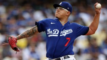 LOS ANGELES, CALIFORNIA - AUGUST 19: Julio Urías #7 of the Los Angeles Dodgers pitches against the Miami Marlins during the second inning at Dodger Stadium on August 19, 2023 in Los Angeles, California. (Photo by Harry How/Getty Images)