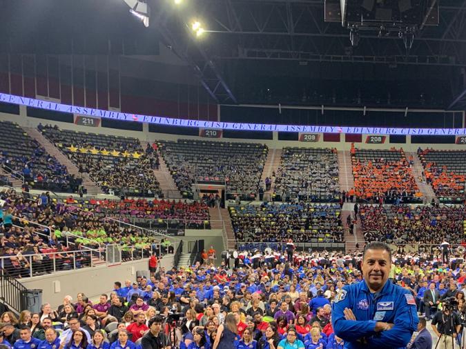 José Hernández standing in front of crowd