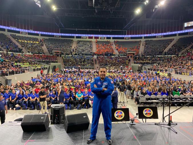 José Hernández standing in front of crowd