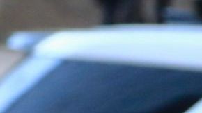 Police vehicles with overhead strobe lights at a crime scene - stock photo