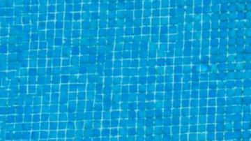 Woman by poolside
