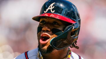ATLANTA, GA - SEPTEMBER 10: Ronald Acuña Jr. #13 of the Atlanta Braves celebrates after hitting an RBI single in the seventh inning against the Pittsburgh Pirates at Truist Park on September 10, 2023 in Atlanta, Georgia. (Photo by Matthew Grimes Jr./Atlanta Braves/Getty Images)