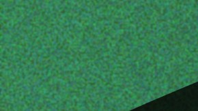 skeletal hand reaching over to grab a spooky book for Halloween