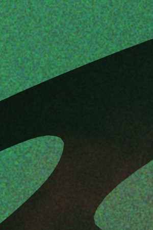 skeletal hand reaching over to grab a spooky book for Halloween