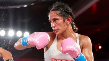 ORLANDO, FL - OCTOBER 27: Amanda Serrano (R) exchanges punches with Danila Ramos during the MVP boxing match at the Caribe Royale Orlando resort on October 27, 2023 in Orlando, Florida. (Photo by Alex Menendez/Getty Images)