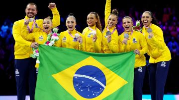 ANTWERP, BELGIUM - OCTOBER 04: Silver medalists of Team Brazil pose for a photo during the medal ceremony for the Women's Team Final on Day Five of the 2023 Artistic Gymnastics World Championships on October 04, 2023 in Antwerp, Belgium. (Photo by Naomi Baker/Getty Images)