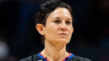 CHARLOTTE, NORTH CAROLINA - OCTOBER 13: Referee Che Flores #91 looks on during the game between the Charlotte Hornets and the Dallas Mavericks at Spectrum Center on October 13, 2021 in Charlotte, North Carolina. NOTE TO USER: User expressly acknowledges and agrees that, by downloading and or using this photograph, User is consenting to the terms and conditions of the Getty Images License Agreement. (Photo by Jacob Kupferman/Getty Images)