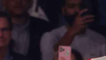LAS VEGAS, NEVADA - SEPTEMBER 30: A Mexican flag is waved over Canelo Alvarez as he enters the ring for his super middleweight title fight against Jermell Charlo at T-Mobile Arena on September 30, 2023 in Las Vegas, Nevada. Alvarez won by unanimous decision. (Photo by Ethan Miller/Getty Images)