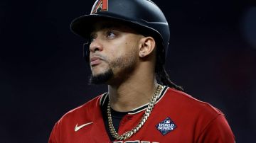 ARLINGTON, TEXAS - OCTOBER 27: Ketel Marte #4 of the Arizona Diamondbacks walks across the field in the fourth inning against the Texas Rangers during Game One of the World Series at Globe Life Field on October 27, 2023 in Arlington, Texas. (Photo by Carmen Mandato/Getty Images)