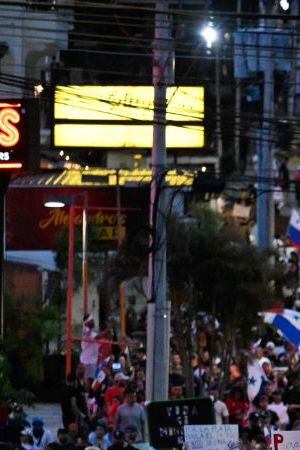 Demonstrators protest against the contract for the Canadian mining company FQM in Panama City, Panama 24 October 2023. Demonstrators and police clashed Tuesday in Panama as protests over a copper mine spilled into their fifth day, with President Laurentino Cortizo vowing he would prosecute acts of "vandalism." The protesters are concerned about potential environmental damage from operations at the mine owned by First Quantum, a Canadian firm and one of the biggest copper extractors in the world. After protests erupted on Friday and continued over the weekend, demonstrators had yet to let up by Tuesday in Panama City and in other provinces. (Photo by LUIS ACOSTA / AFP) (Photo by LUIS ACOSTA/AFP via Getty Images)