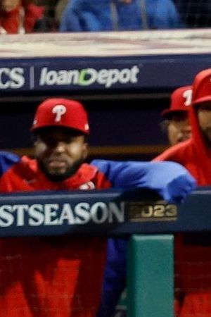 PHILADELPHIA, PENNSYLVANIA - OCTOBER 16: Brandon Marsh #16 of the Philadelphia Phillies runs to first base for a single in the fourth inning against the Arizona Diamondbacks during Game One of the Championship Series at Citizens Bank Park on October 16, 2023 in Philadelphia, Pennsylvania. (Photo by Sarah Stier/Getty Images)