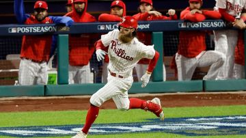 PHILADELPHIA, PENNSYLVANIA - OCTOBER 16: Brandon Marsh #16 of the Philadelphia Phillies runs to first base for a single in the fourth inning against the Arizona Diamondbacks during Game One of the Championship Series at Citizens Bank Park on October 16, 2023 in Philadelphia, Pennsylvania. (Photo by Sarah Stier/Getty Images)