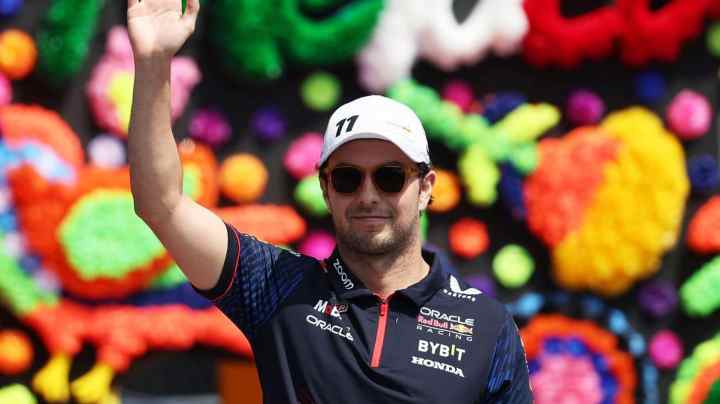 MEXICO CITY, MEXICO - OCTOBER 29: Max Verstappen of the Netherlands and Oracle Red Bull Racing and Sergio Pérez of Mexico and Oracle Red Bull Racing wave to the crowd on the drivers parade prior to the F1 Grand Prix of Mexico at Autodromo Hermanos Rodriguez on October 29, 2023 in Mexico City, Mexico. (Photo by Jared C. Tilton/Getty Images)