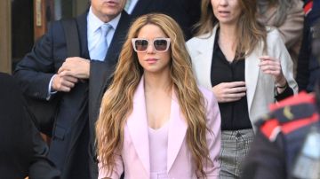 TOPSHOT - Colombian singer Shakira (C) leaves the High Court of Justice of Catalonia after attending her trial on tax fraud, in Barcelona on November 20, 2023. Colombian superstar Shakira has reached a deal with prosecutors to end her trial for allegedly defrauding the Spanish state of 14.5 million euros ($15.7 million) on income earned between 2012 and 2014, a Barcelona court said. Under the deal, the 46-year-old agreed to receive a three-year suspended sentence in exchange for paying millions of euros in fines, the head of the court said on what would have been the first day of her trial. (Photo by Josep LAGO / AFP) (Photo by JOSEP LAGO/AFP via Getty Images)